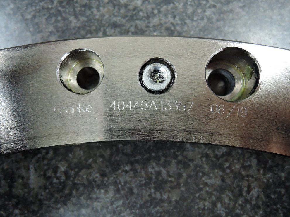 Engraved serial number on the ring of a Franke bearing